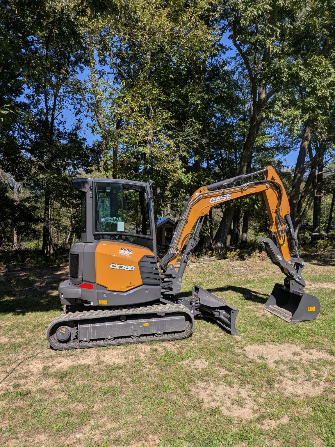 Our Case CX38D compact excavator parked outdoors