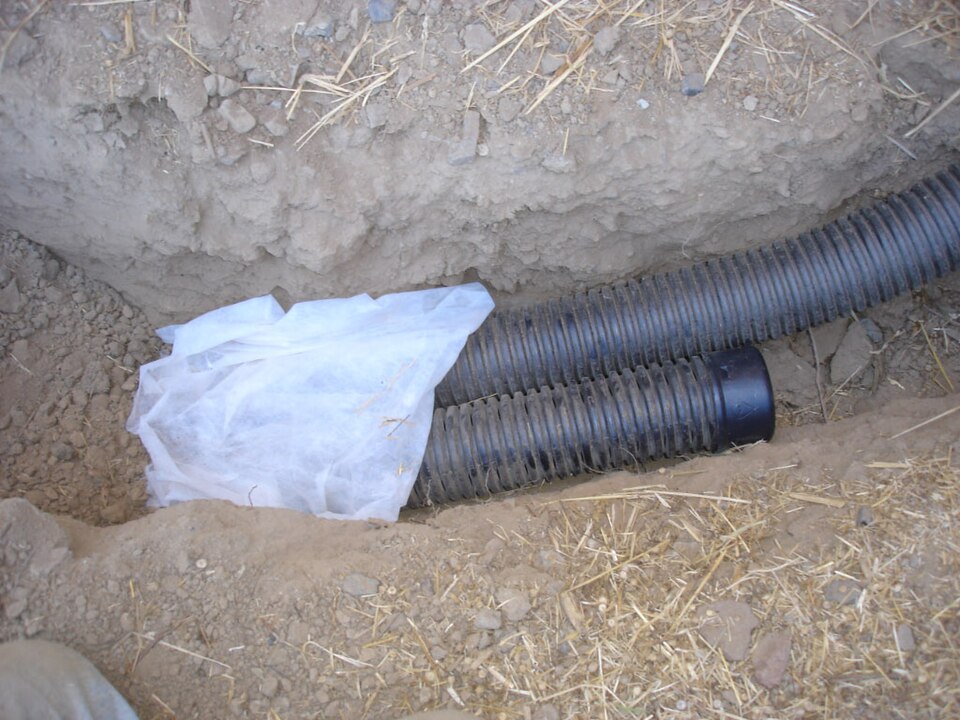 Drainage pipe in an open trench